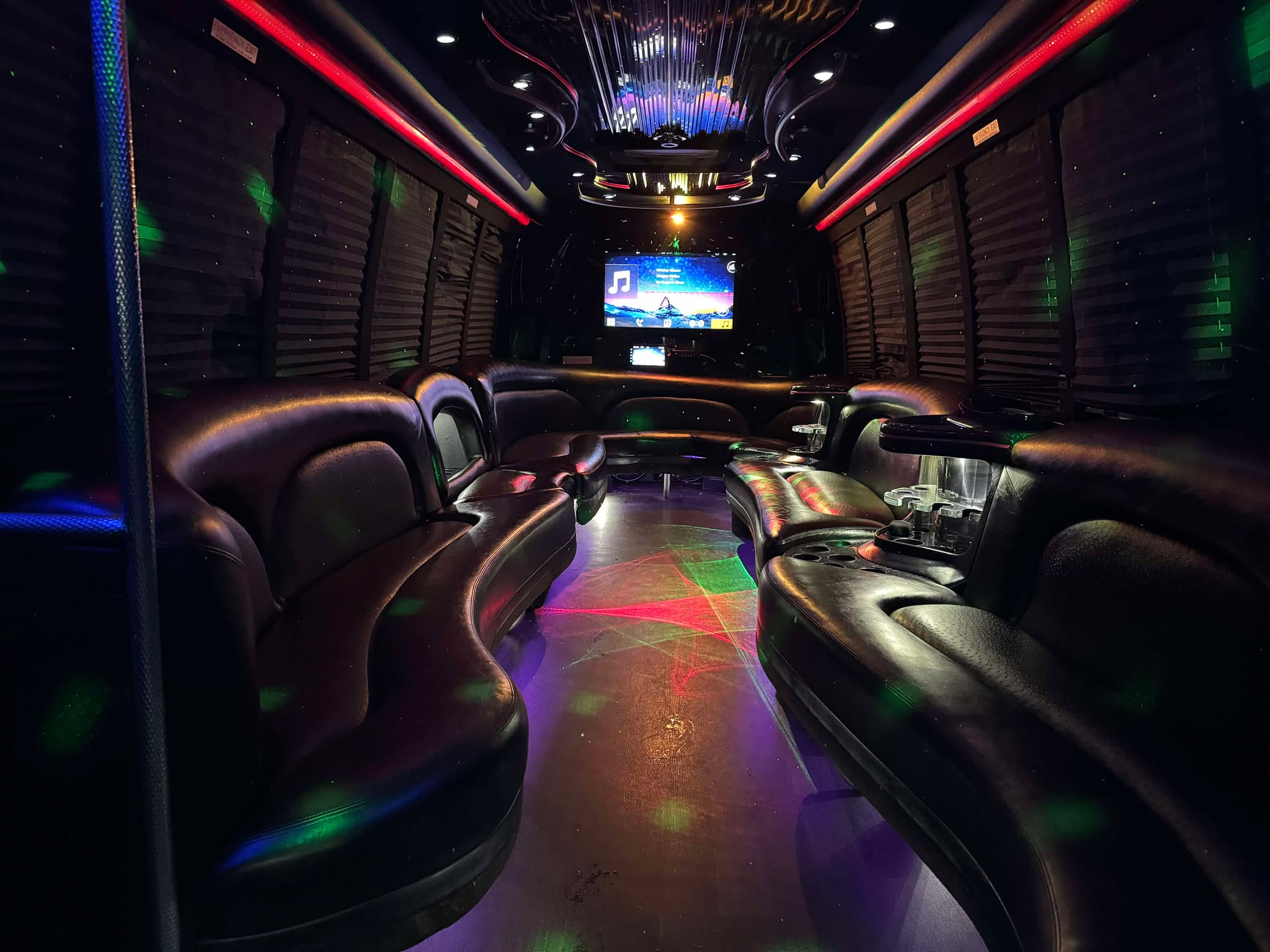 Luxury 28 Passenger Atlanta Party Buses with spacious seating LED lighting and high end sound systems for unforgettable group celebrations.