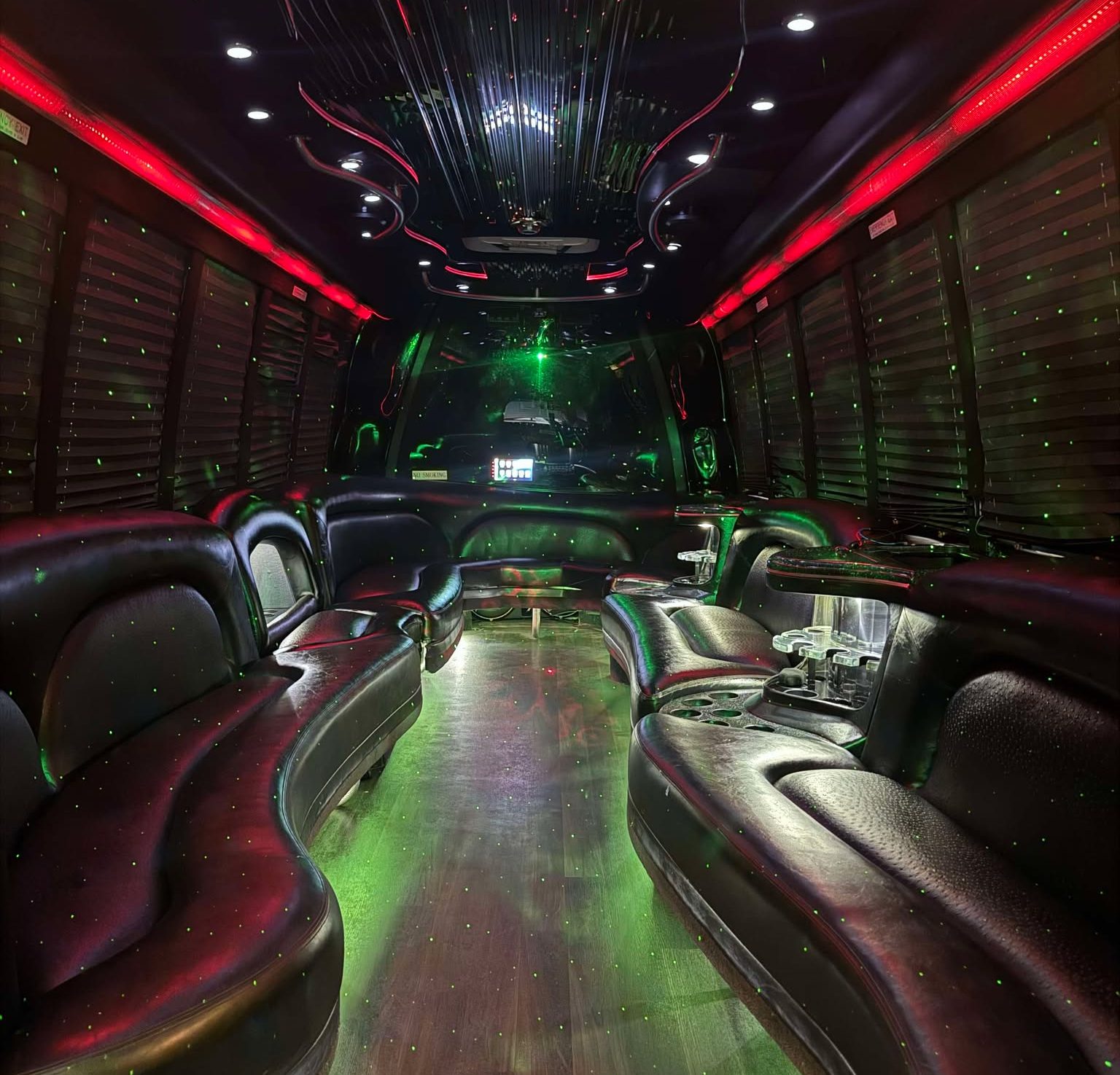 Luxury 28 Passenger Party Buses Rental in Atlanta with premium seating LED lighting and high quality sound systems for group celebrations