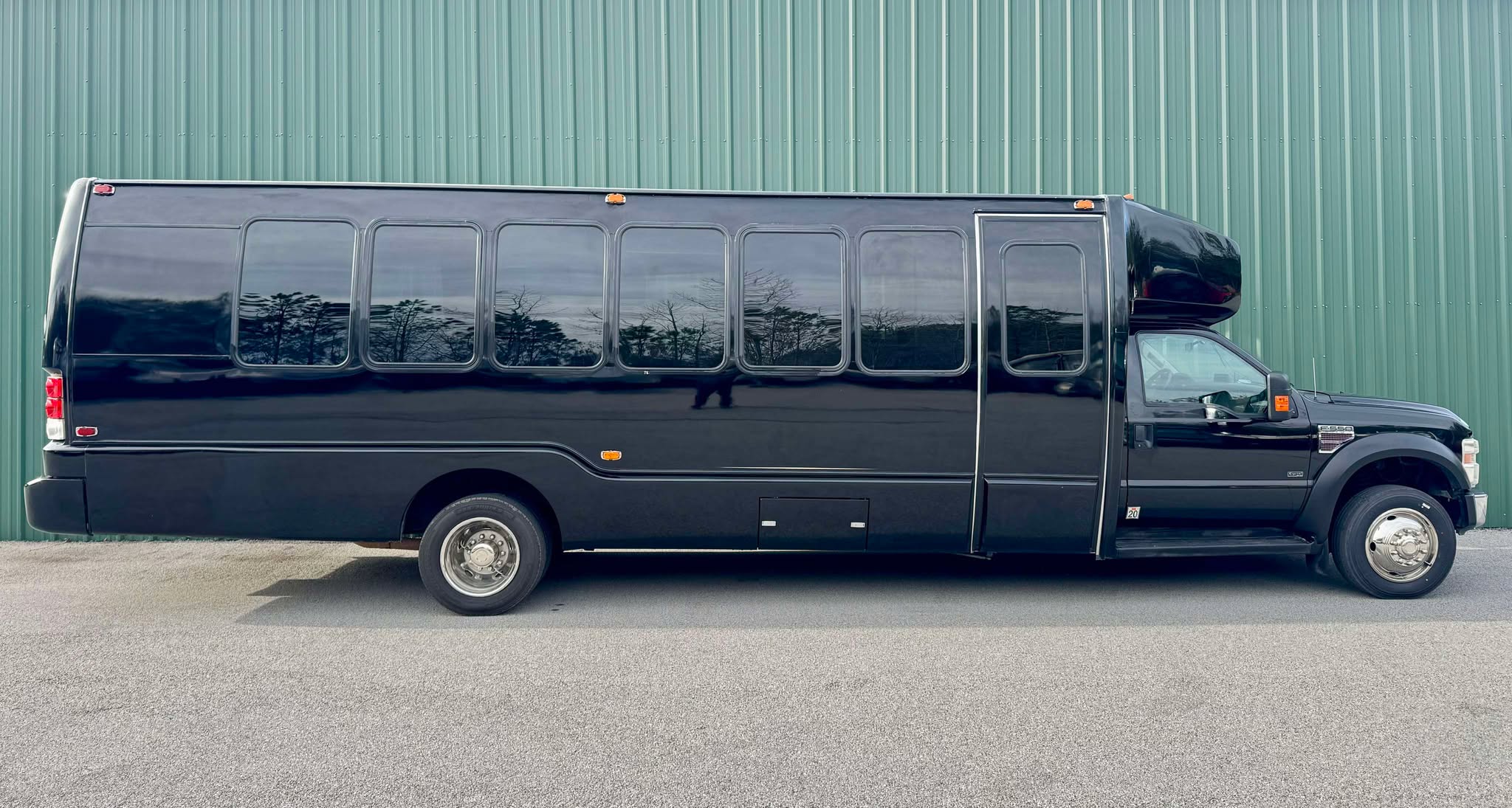 Luxury 28 Passenger Party Buses Rental in Atlanta with spacious seating LED lighting and premium sound systems for unforgettable group celebrations
